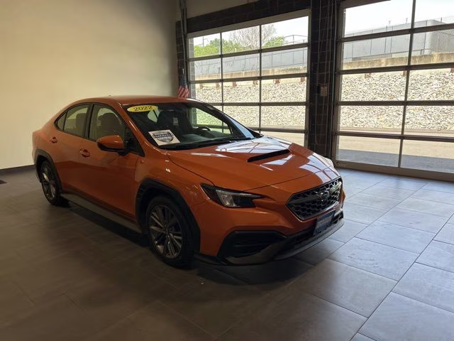 2022 Solar Orange Pearl Subaru WRX Base AWD Sedan