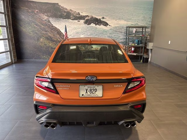 2022 Solar Orange Pearl Subaru WRX Base AWD Sedan