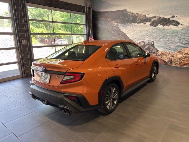 2022 Solar Orange Pearl Subaru WRX Base AWD Sedan
