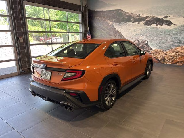 2022 Solar Orange Pearl Subaru WRX Base AWD Sedan