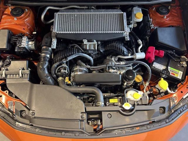 2022 Solar Orange Pearl Subaru WRX Base AWD Sedan