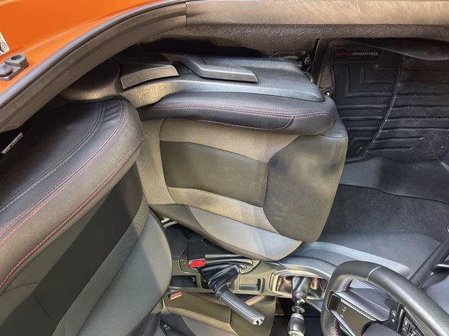 2022 Solar Orange Pearl Subaru WRX Base AWD Sedan