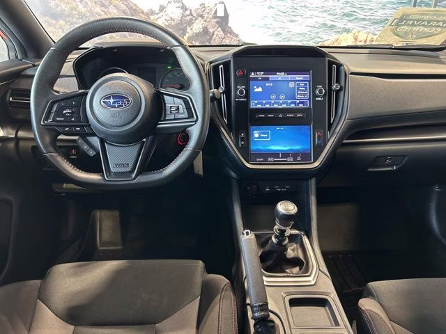 2022 Solar Orange Pearl Subaru WRX Base AWD Sedan