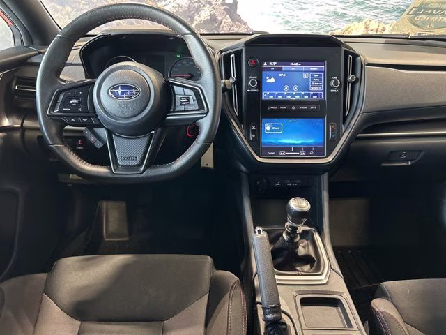 2022 Solar Orange Pearl Subaru WRX Base AWD Sedan