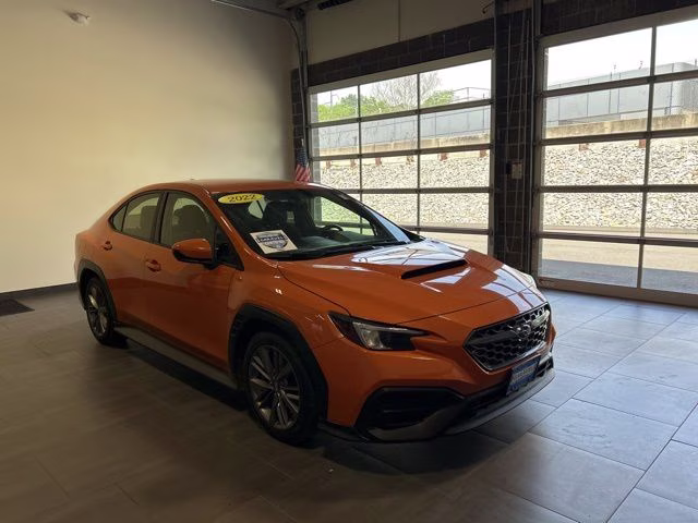 2022 Solar Orange Pearl Subaru WRX Base AWD Sedan
