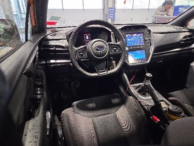 2022 Solar Orange Pearl Subaru WRX Base AWD Sedan