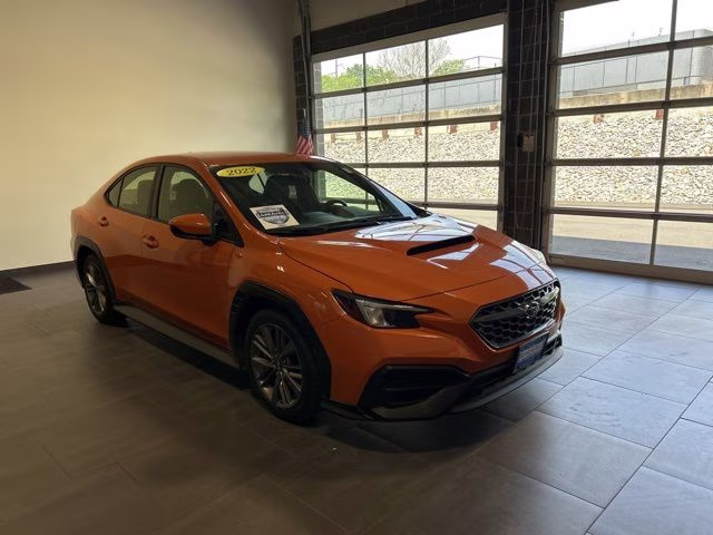 2022 Solar Orange Pearl Subaru WRX Base AWD Sedan