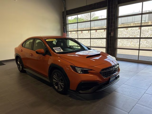 2022 Solar Orange Pearl Subaru WRX Base AWD Sedan