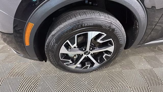 2024 Ebony Black Kia Sportage EX AWD SUV