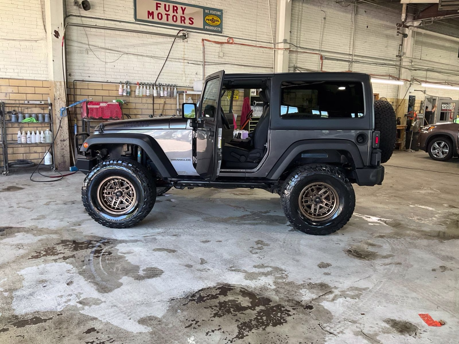 2016 Granite Crystal Metallic Clearcoat Jeep Wrangler Sport 4X4 SUV