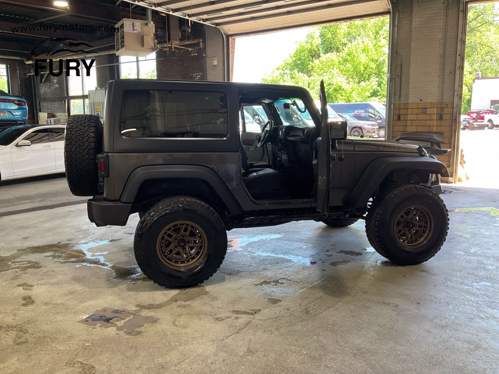 2016 Granite Crystal Metallic Clearcoat Jeep Wrangler Sport 4X4 SUV