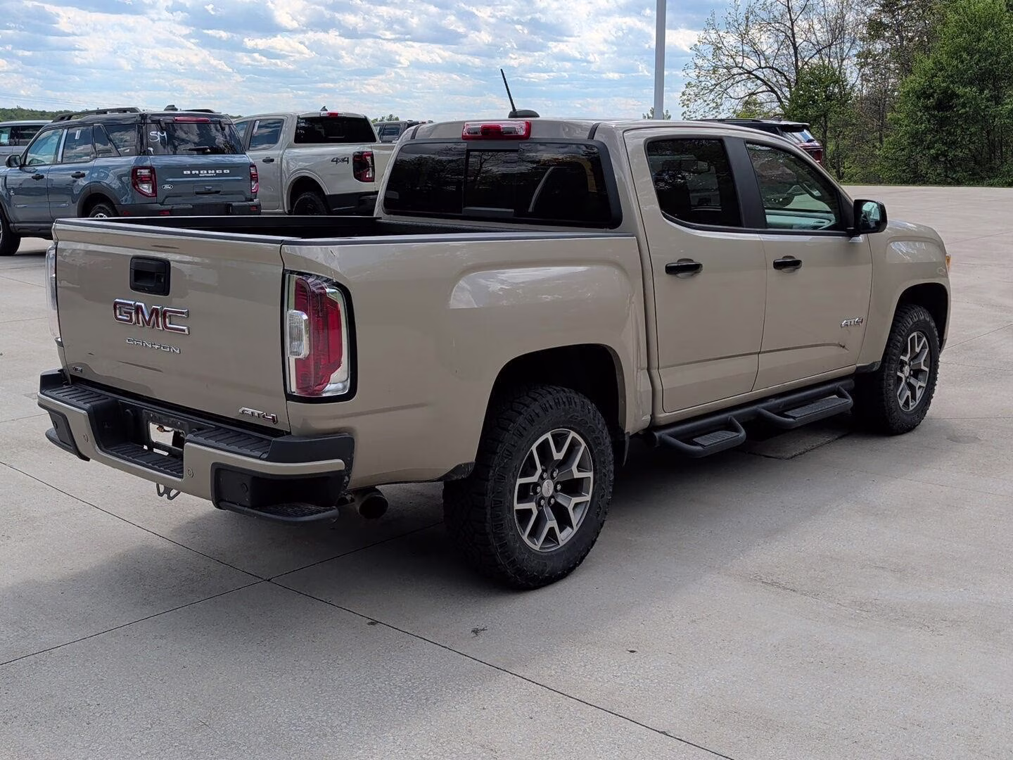 2021 Desert Sand Metallic GMC Canyon 4WD AT4 w/Leather 4X4 Truck