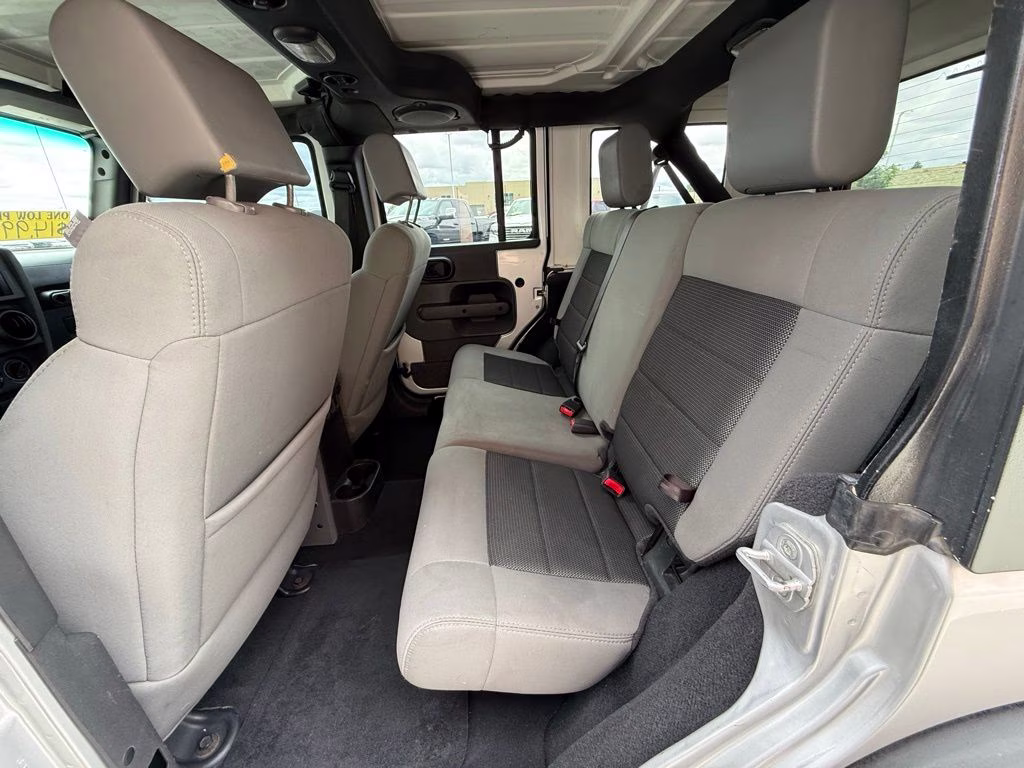 2010 Bright Silver Metallic Clearcoat Jeep Wrangler Unlimited Sport 4X4 SUV