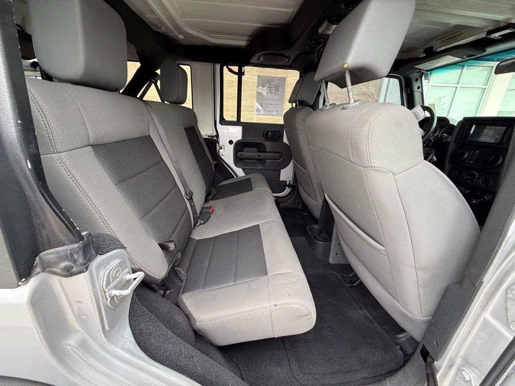 2010 Bright Silver Metallic Clearcoat Jeep Wrangler Unlimited Sport 4X4 SUV