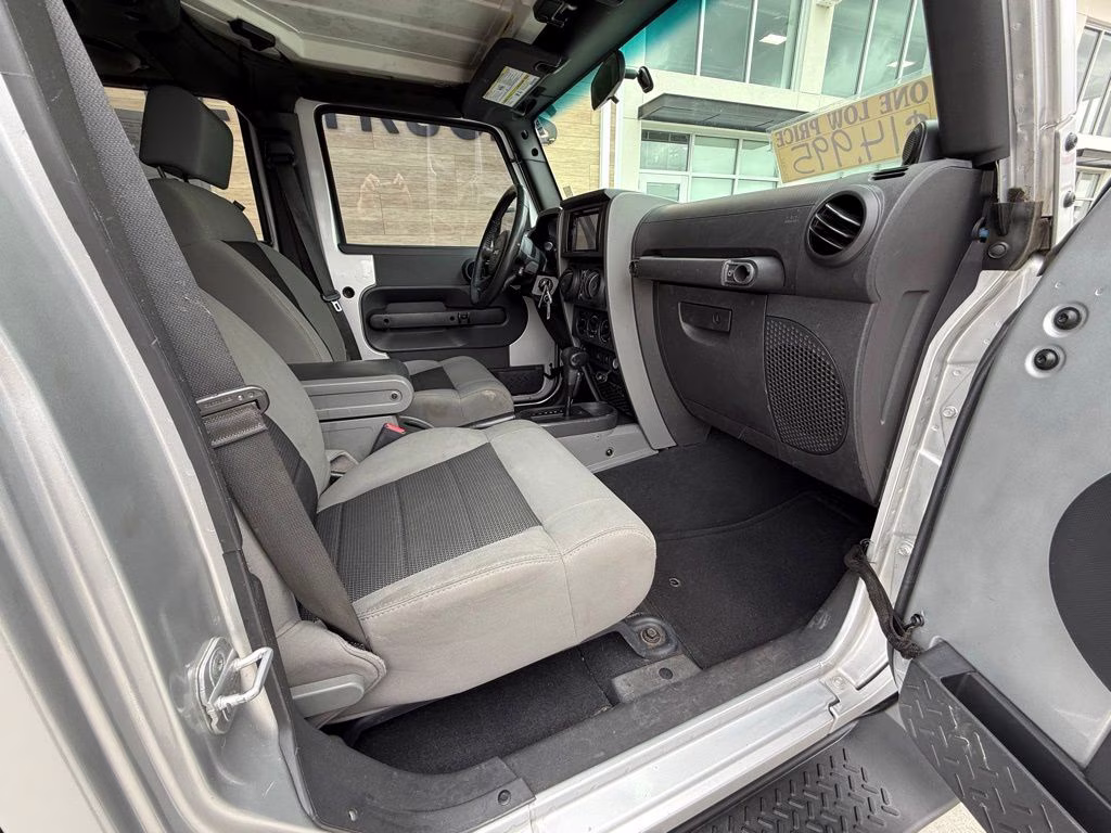 2010 Bright Silver Metallic Clearcoat Jeep Wrangler Unlimited Sport 4X4 SUV
