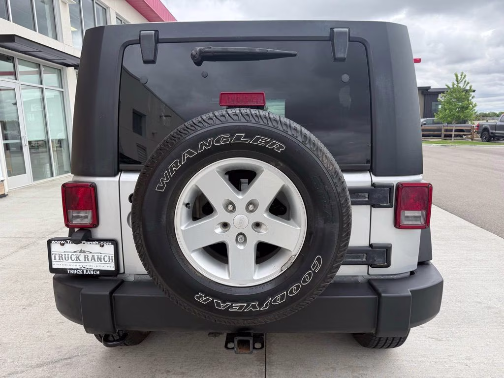 2010 Bright Silver Metallic Clearcoat Jeep Wrangler Unlimited Sport 4X4 SUV