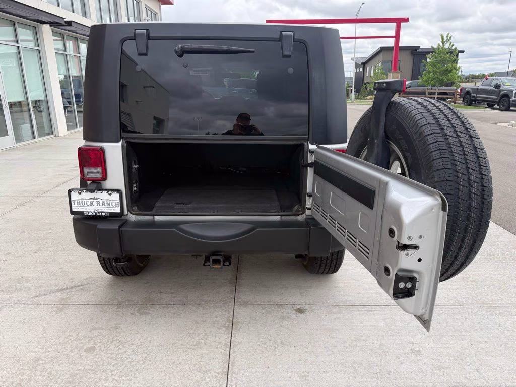 2010 Bright Silver Metallic Clearcoat Jeep Wrangler Unlimited Sport 4X4 SUV