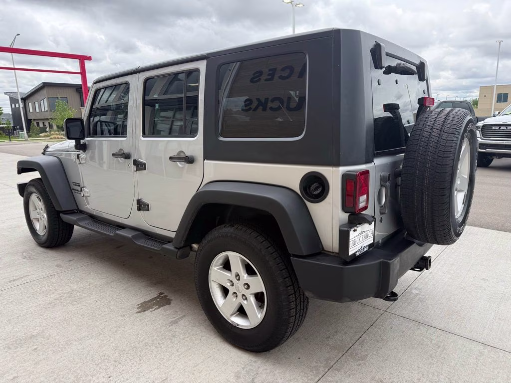 2010 Bright Silver Metallic Clearcoat Jeep Wrangler Unlimited Sport 4X4 SUV