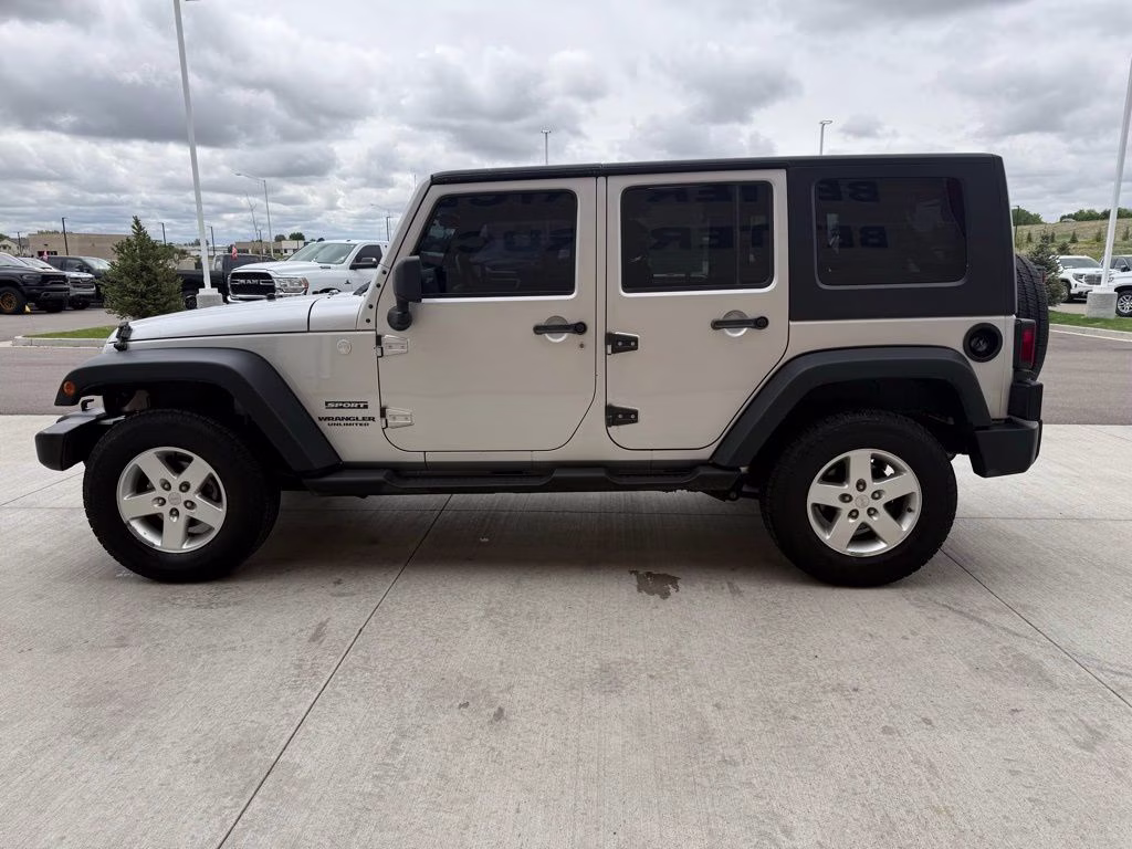 2010 Bright Silver Metallic Clearcoat Jeep Wrangler Unlimited Sport 4X4 SUV