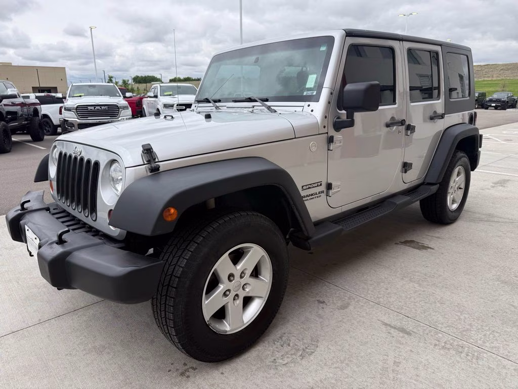 2010 Bright Silver Metallic Clearcoat Jeep Wrangler Unlimited Sport 4X4 SUV