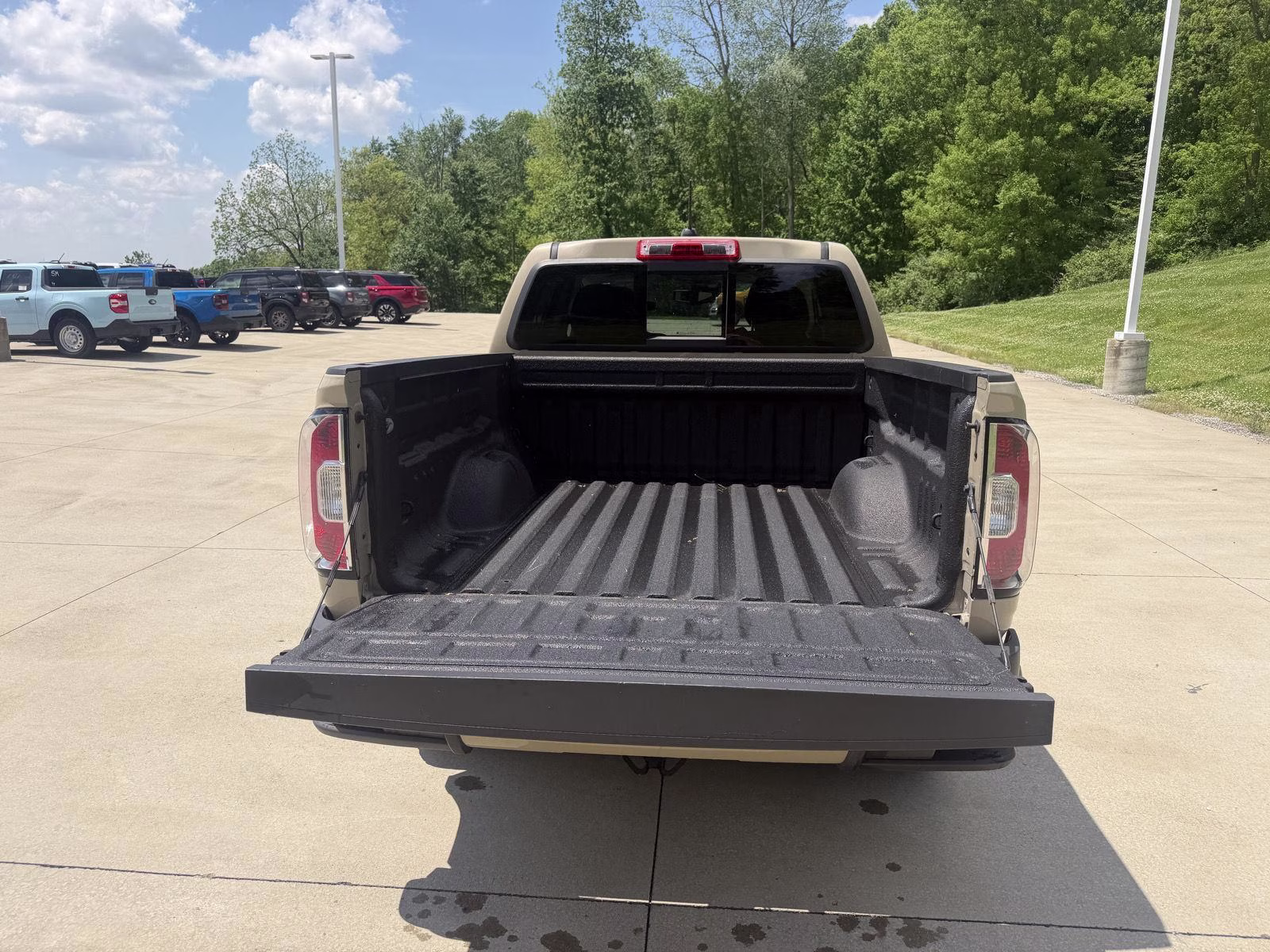 2021 Desert Sand Metallic GMC Canyon 4WD AT4 w/Leather 4X4 Truck