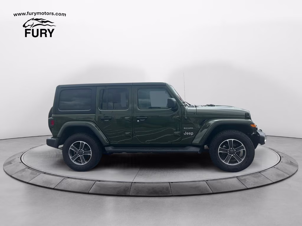 Used 2023 Jeep Wrangler 4-Door Sahara with VIN 1C4HJXEG6PW637982 for sale in Forest Lake, Minnesota