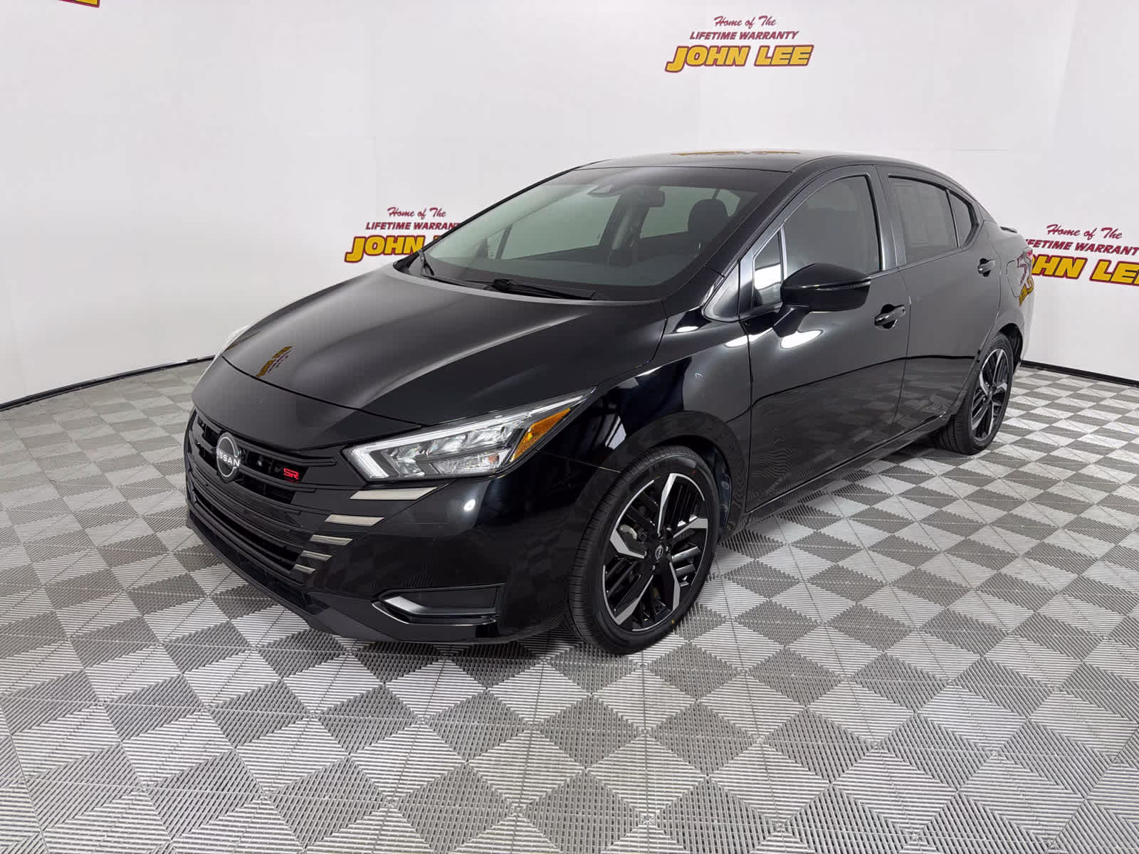 2023 Super Black Nissan Versa SR FWD Sedan