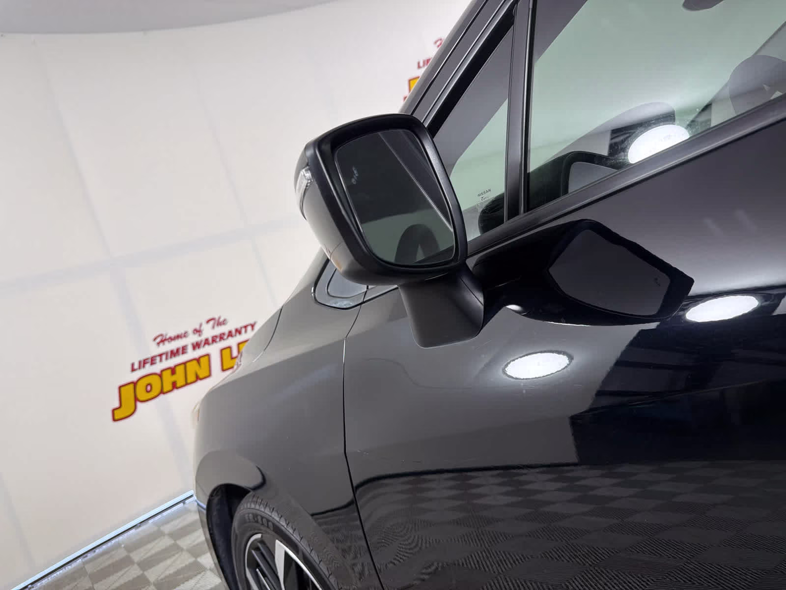 2023 Super Black Nissan Versa SR FWD Sedan