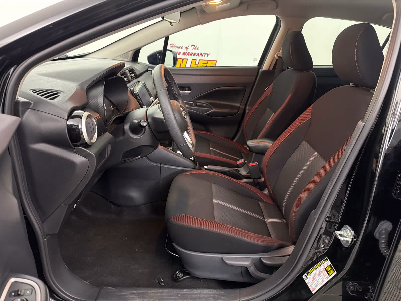 2023 Super Black Nissan Versa SR FWD Sedan
