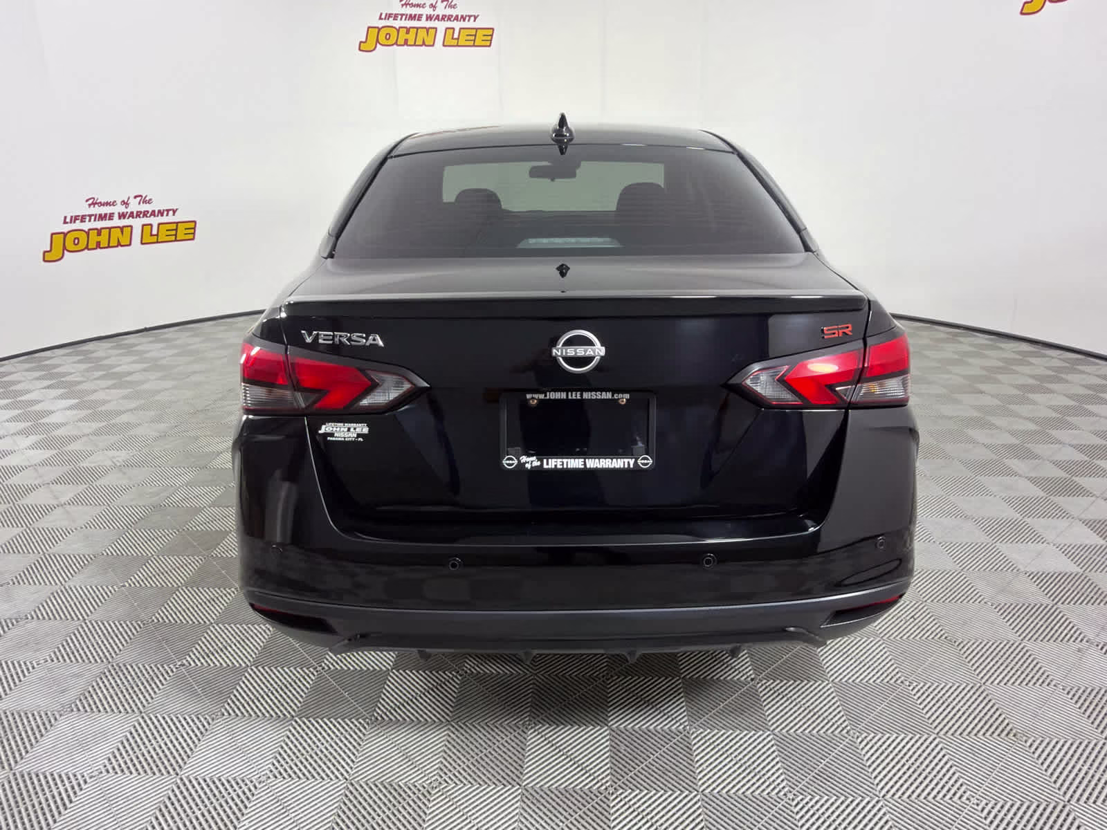 2023 Super Black Nissan Versa SR FWD Sedan