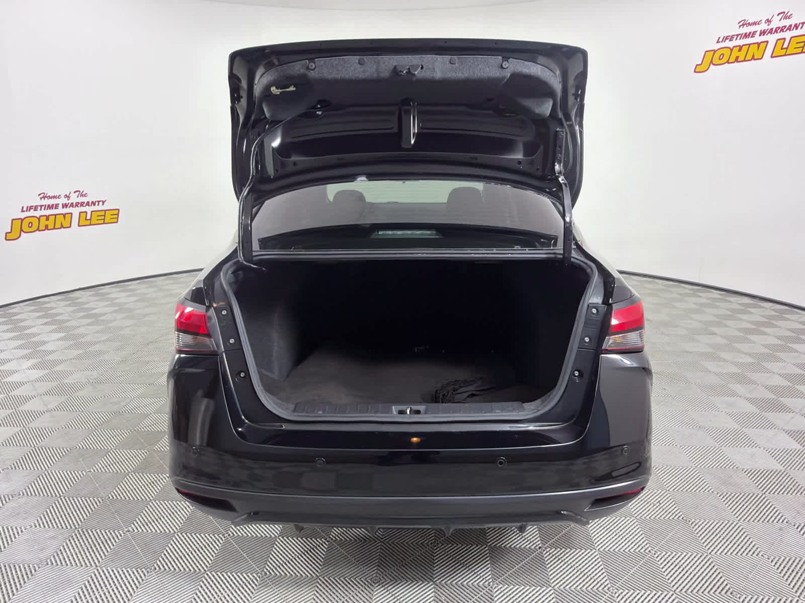 2023 Super Black Nissan Versa SR FWD Sedan