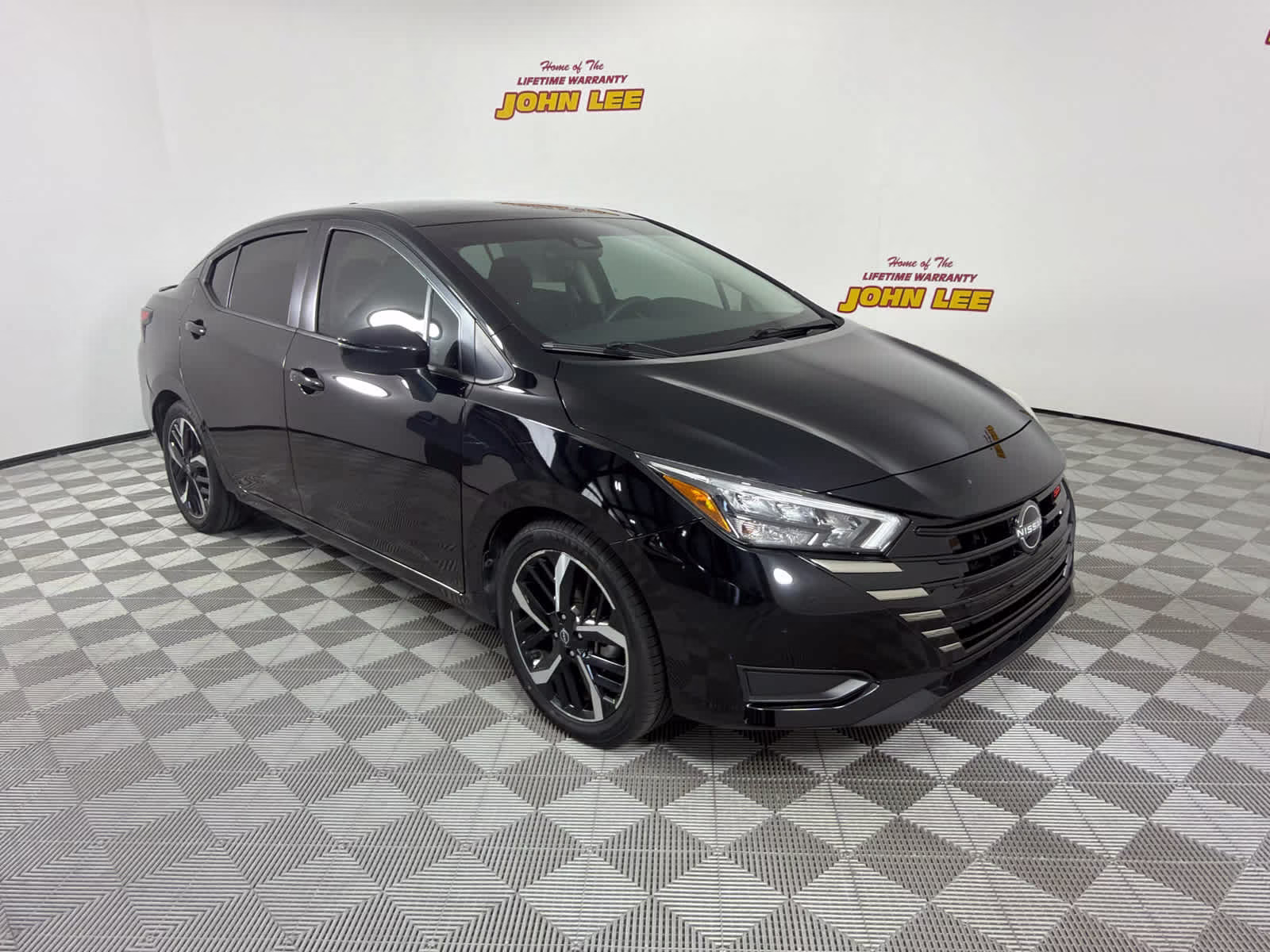 2023 Super Black Nissan Versa SR FWD Sedan
