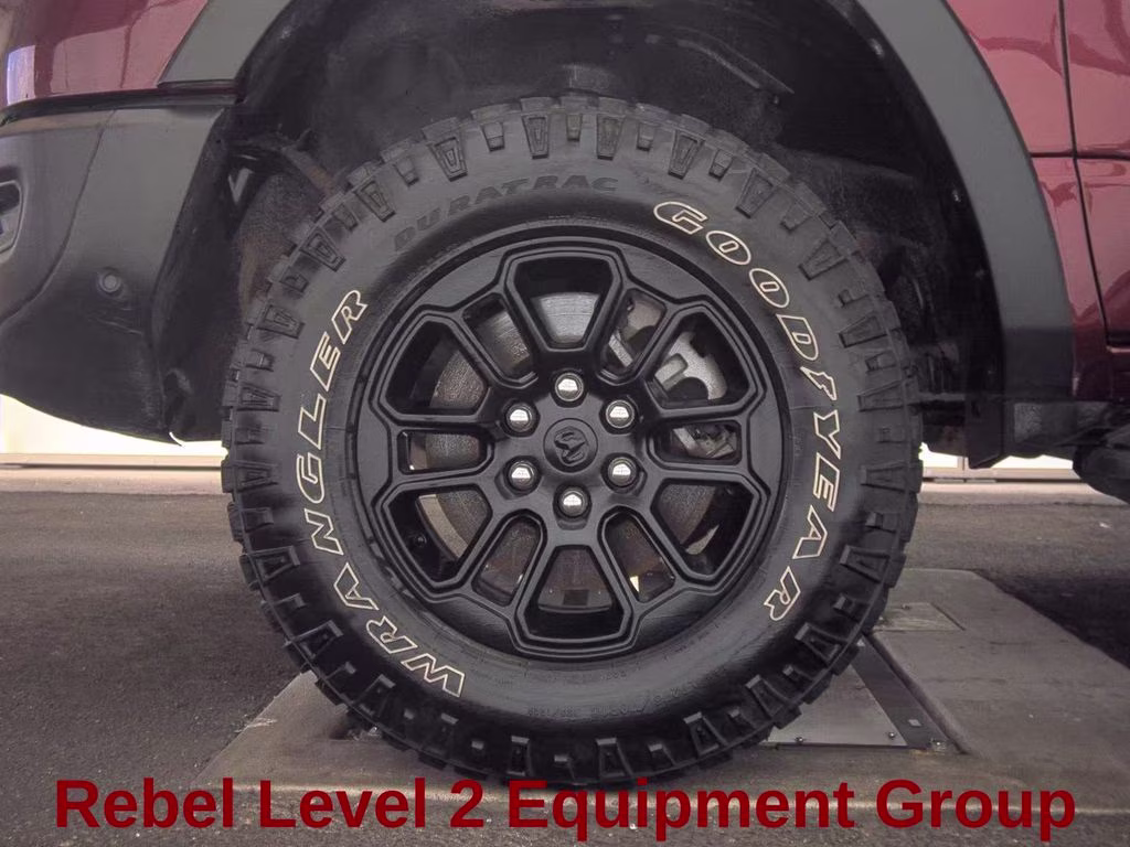 2025 Delmonico Red Pearlcoat Ram 1500 Rebel 4X4 Truck