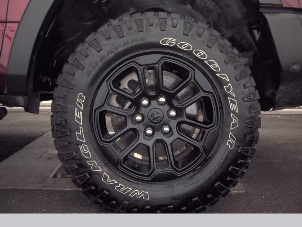 2025 Delmonico Red Pearlcoat Ram 1500 Rebel 4X4 Truck