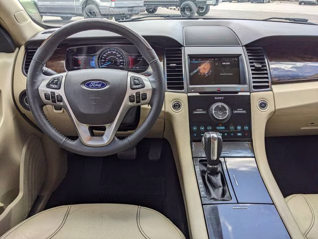 2018 White Platinum Clearcoat Metallic Ford Taurus Limited FWD Sedan