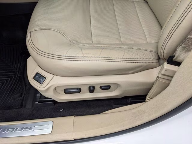 2018 White Platinum Clearcoat Metallic Ford Taurus Limited FWD Sedan