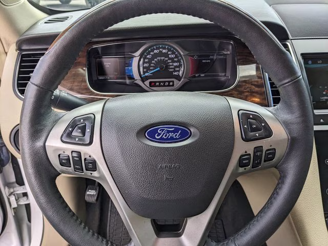 2018 White Platinum Clearcoat Metallic Ford Taurus Limited FWD Sedan