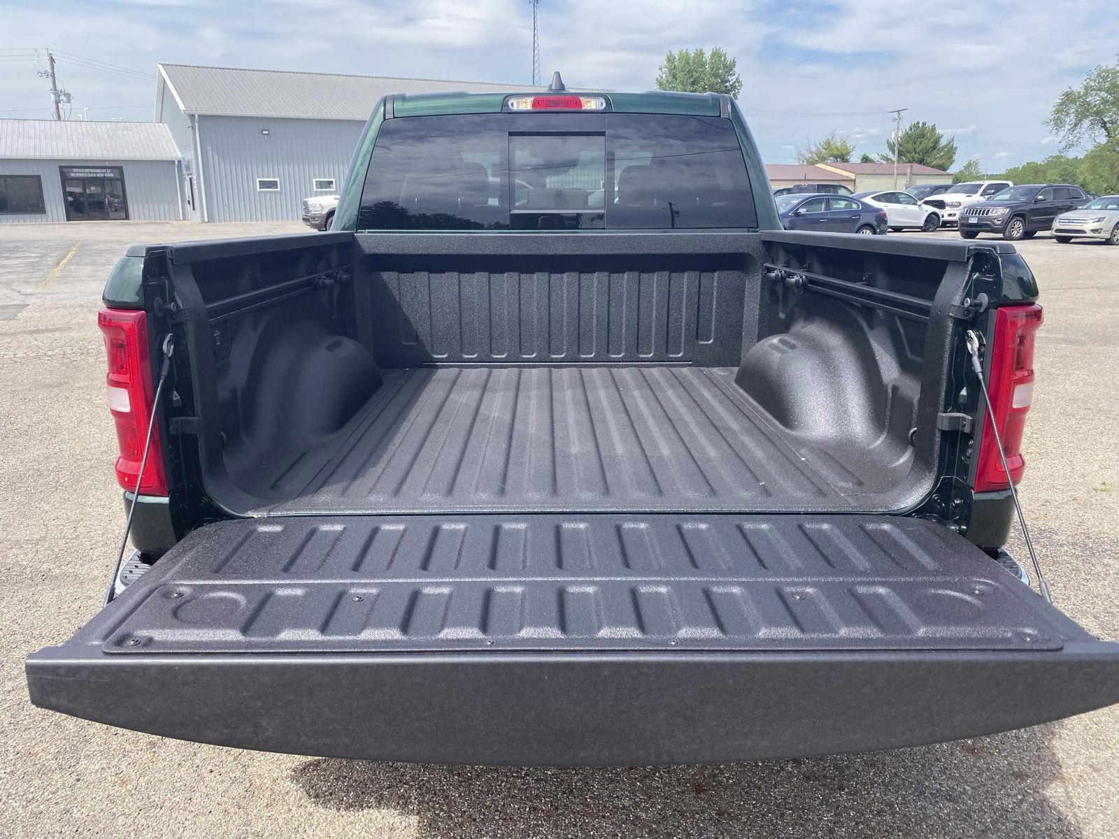 2026 Serrano Green Metallic Ram 1500 Laramie 4X4 Truck