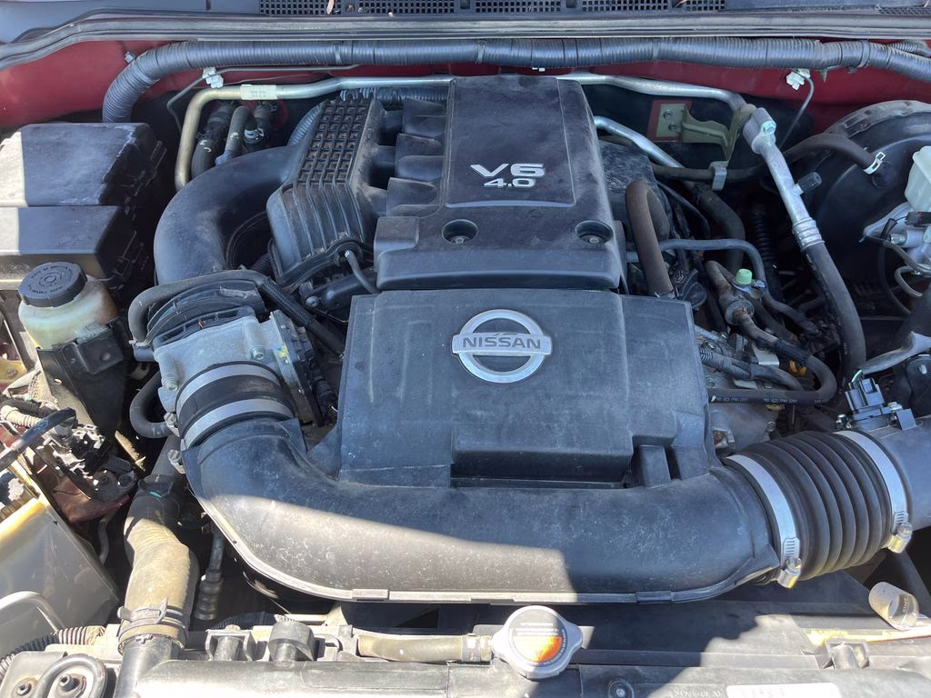2013 Lava Red Nissan Frontier SV RWD Truck