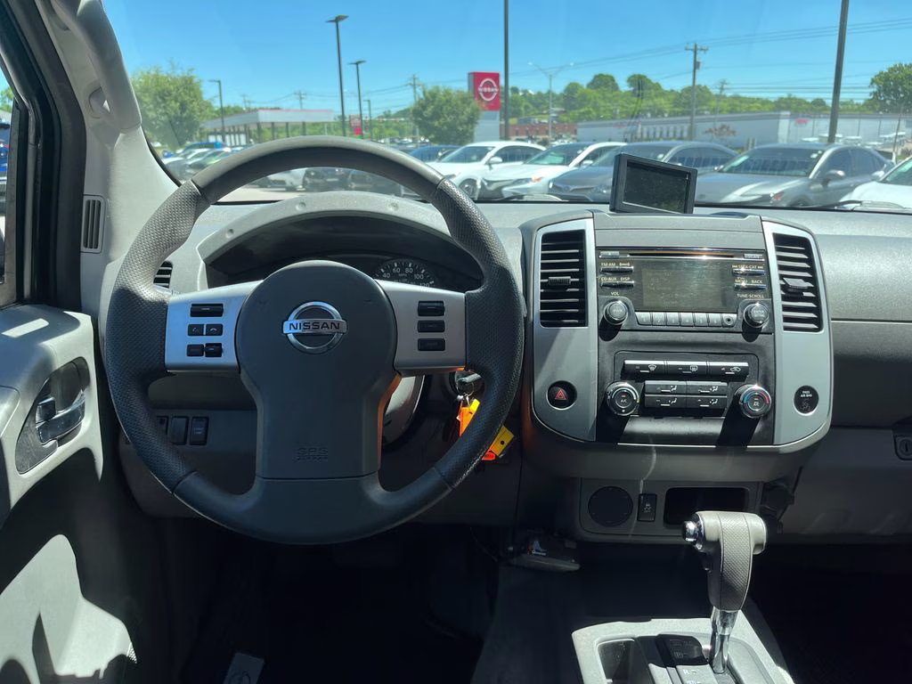 2013 Lava Red Nissan Frontier SV RWD Truck