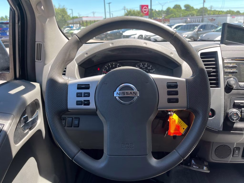 2013 Lava Red Nissan Frontier SV RWD Truck