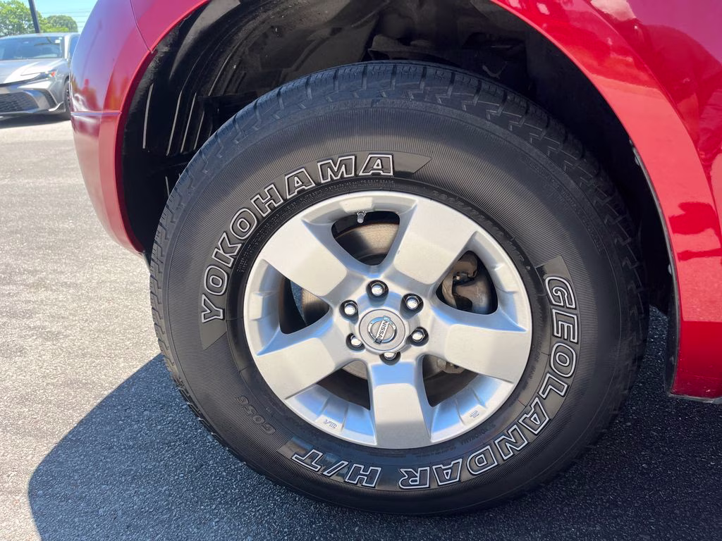 2013 Lava Red Nissan Frontier SV RWD Truck