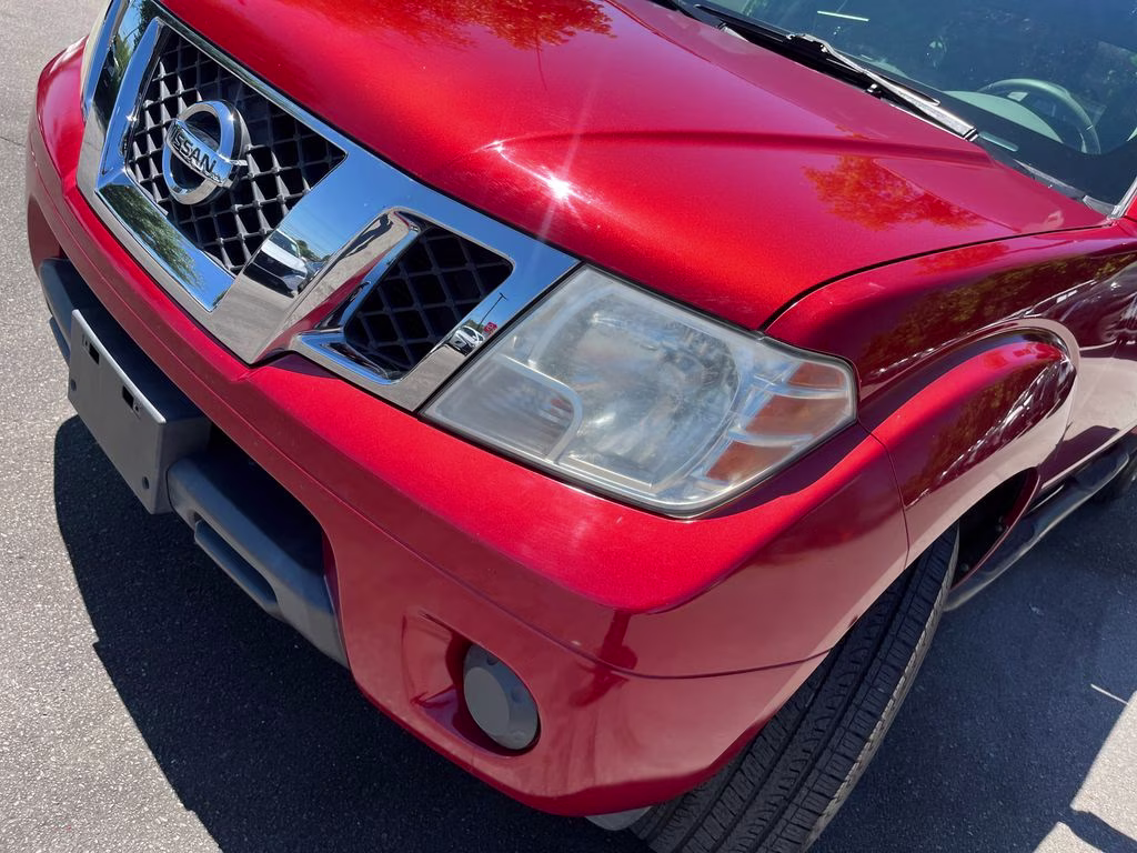 2013 Lava Red Nissan Frontier SV RWD Truck