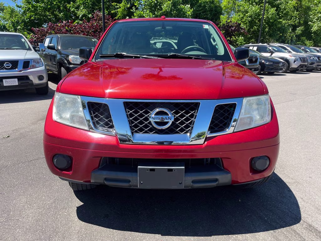 2013 Lava Red Nissan Frontier SV RWD Truck