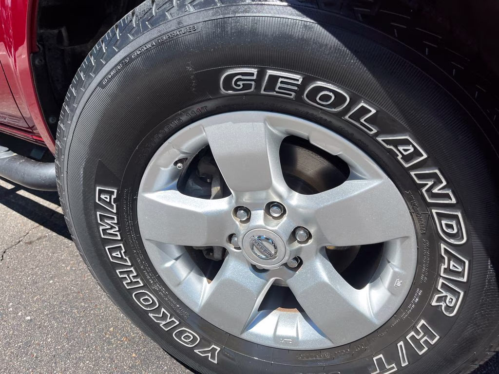 2013 Lava Red Nissan Frontier SV RWD Truck