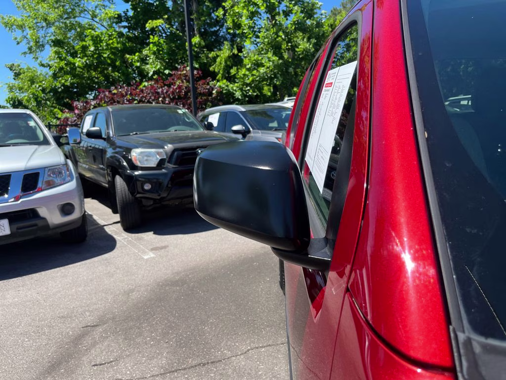 2013 Lava Red Nissan Frontier SV RWD Truck
