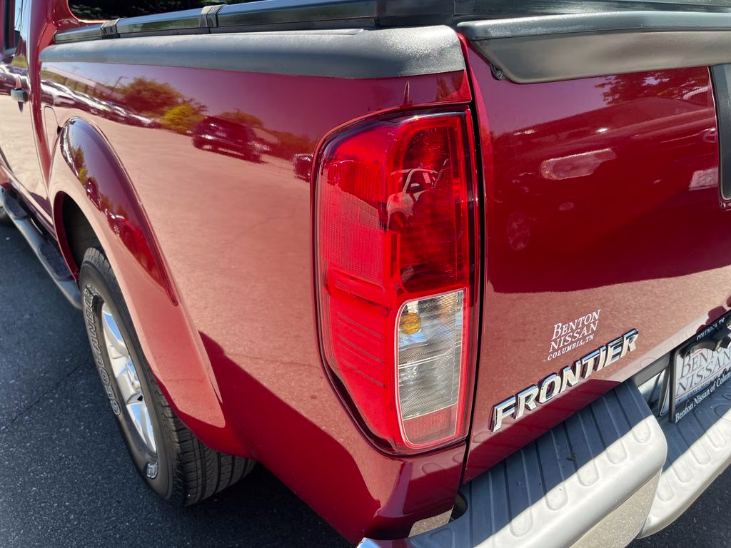 2013 Lava Red Nissan Frontier SV RWD Truck