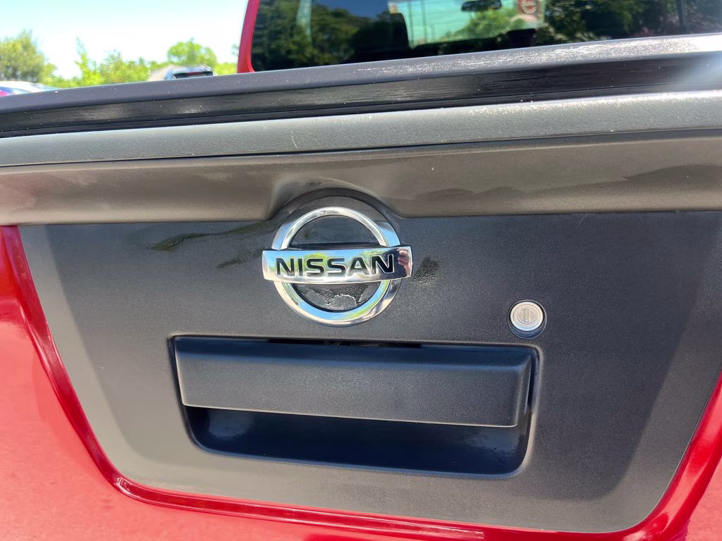 2013 Lava Red Nissan Frontier SV RWD Truck