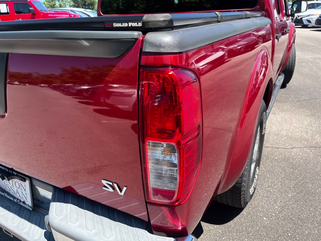 2013 Lava Red Nissan Frontier SV RWD Truck