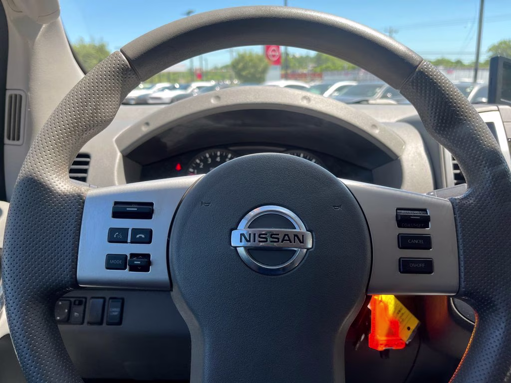 2013 Lava Red Nissan Frontier SV RWD Truck